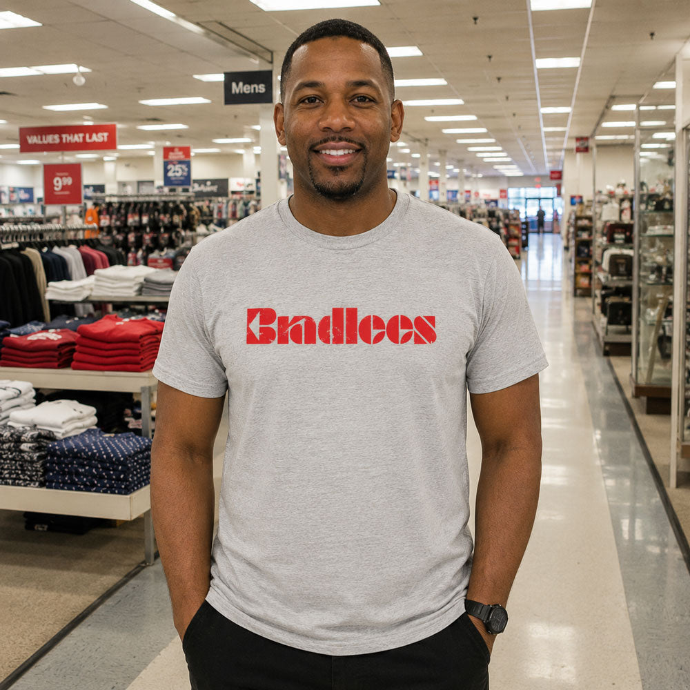 Man standing in a clothing store wearing Bradlees Department Store NJ retro t-shirt