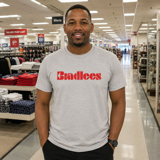 Man standing in a clothing store wearing Bradlees Department Store NJ retro t-shirt
