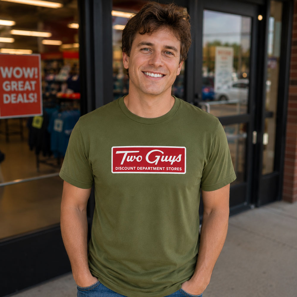 Man standing outside a department storefront wearing Two Guys Discount Department Stores NJ t-shirt