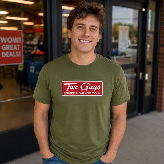 Man standing outside a department storefront wearing Two Guys Discount Department Stores NJ t-shirt